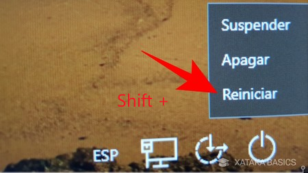 Tecla Mayús y botón Reiniciar